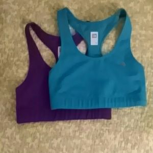 Two North Face sports bras